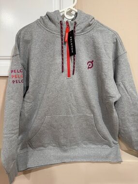 Peloton Gray Hoodie with Pink Logo and Red Zip Accent